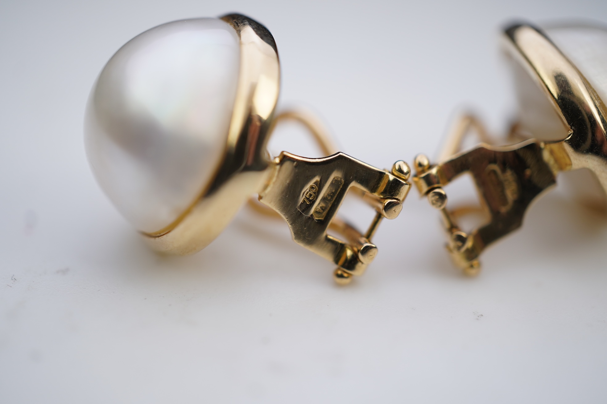 A pair of mabé cultured pearl earrings